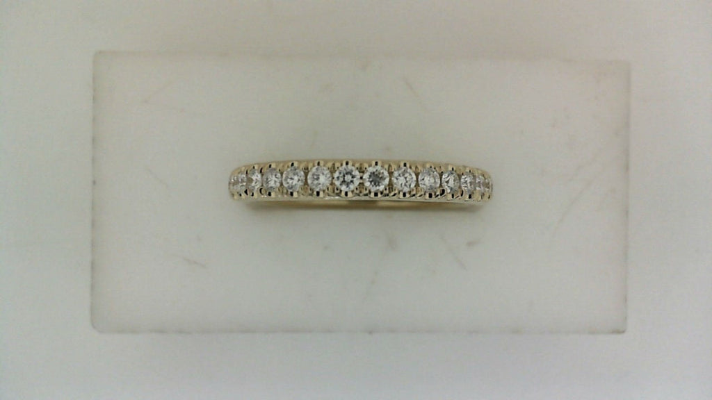 Diamond band in white gold with round stones.