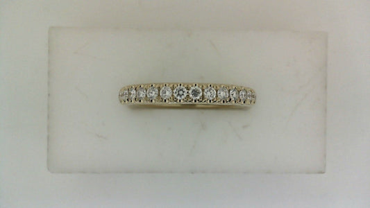 Diamond band in white gold with round stones.