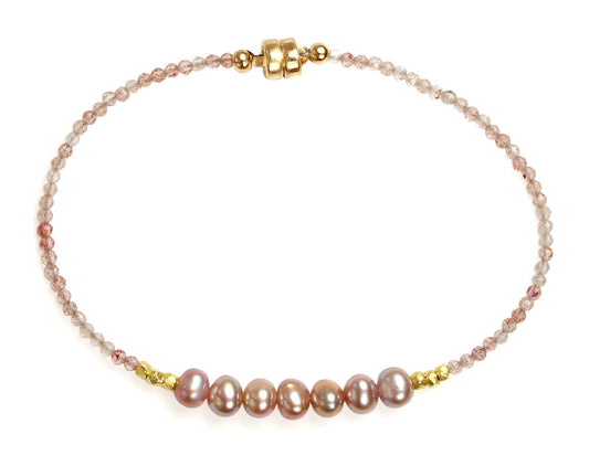 Pink pearl and quartz bead bracelet.