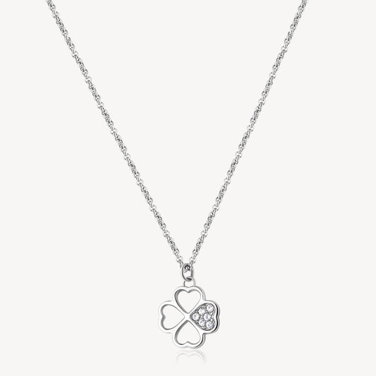 Clover pendant with simulated diamond accents.