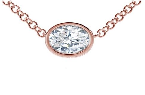 Oval diamond rose gold necklace with chain.