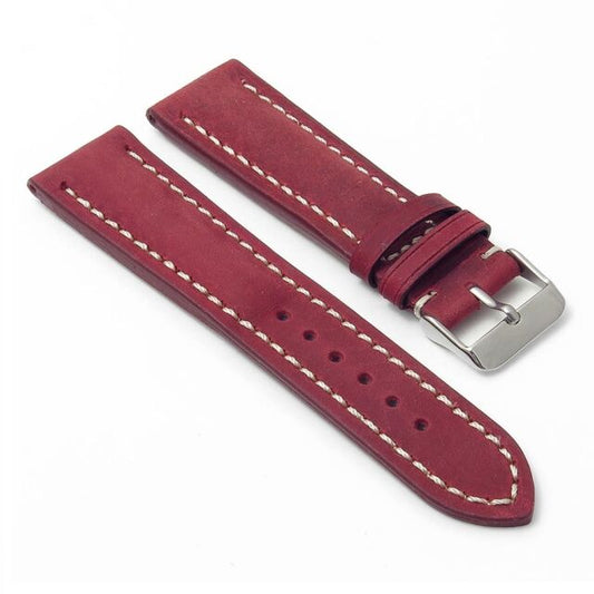 Red leather watch band with tang buckle.