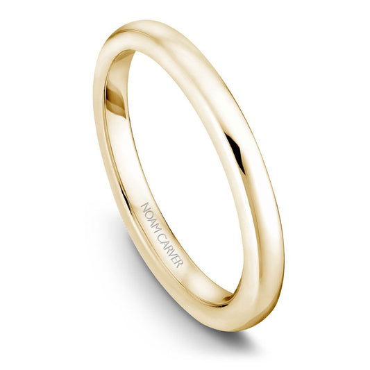 Polished yellow gold carved band ring.