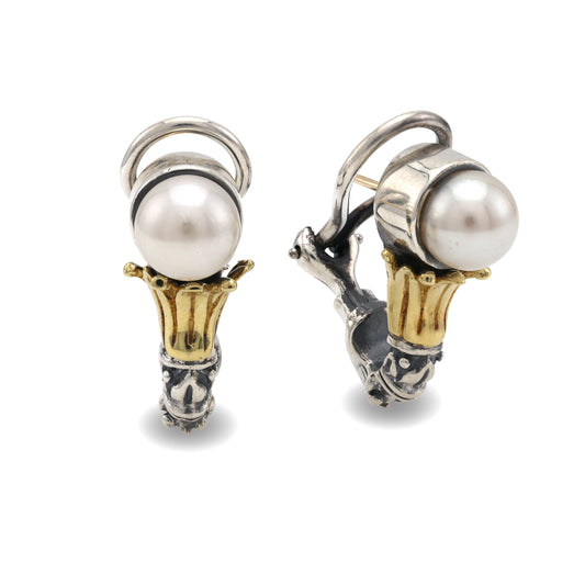 Sterling silver earrings with pearls and gold accents.