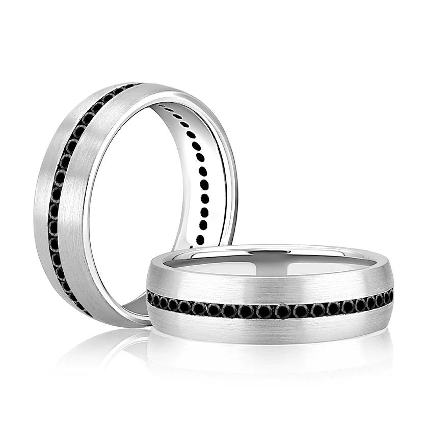 14K white gold band with black diamonds.