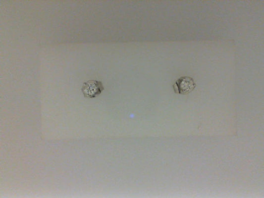 Diamond studs in white gold setting.