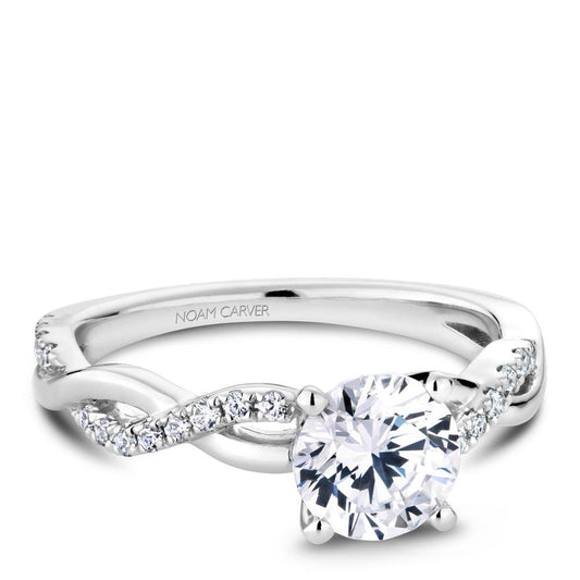 14K white gold diamond twist ring.