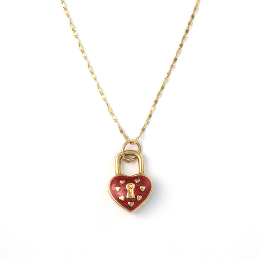 Heart-shaped gold necklace with red enamel.