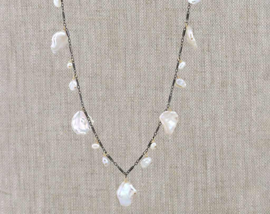 Gold-filled necklace with white baroque pearls.