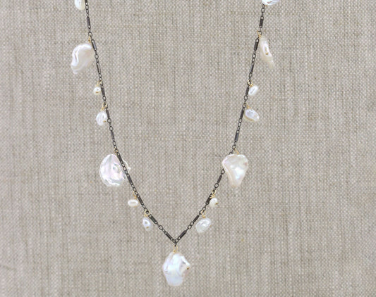 Gold-filled necklace with white baroque pearls.