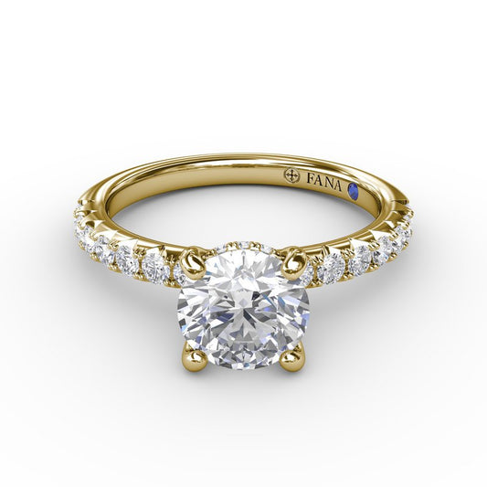 Yellow gold ring with round diamonds.
