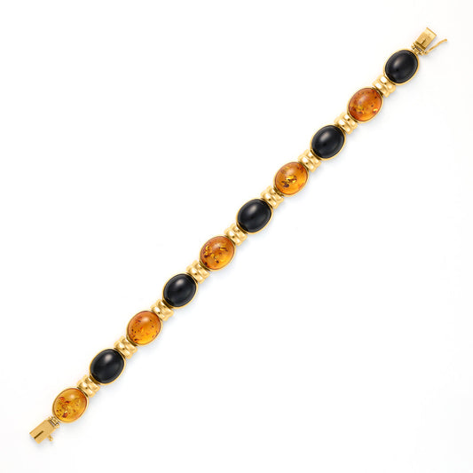 14K gold bracelet with onyx, amber cabochons.