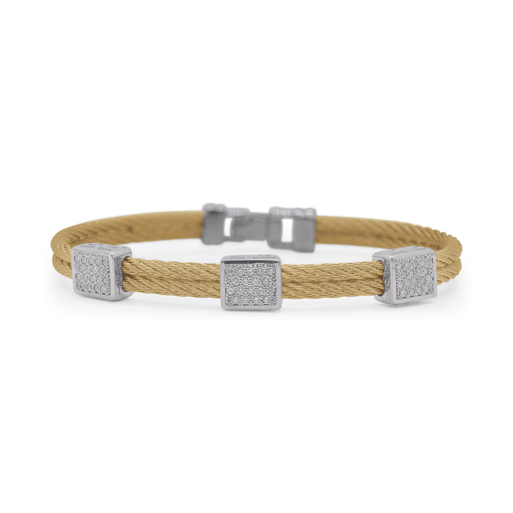 Yellow cable bracelet with diamond accents.