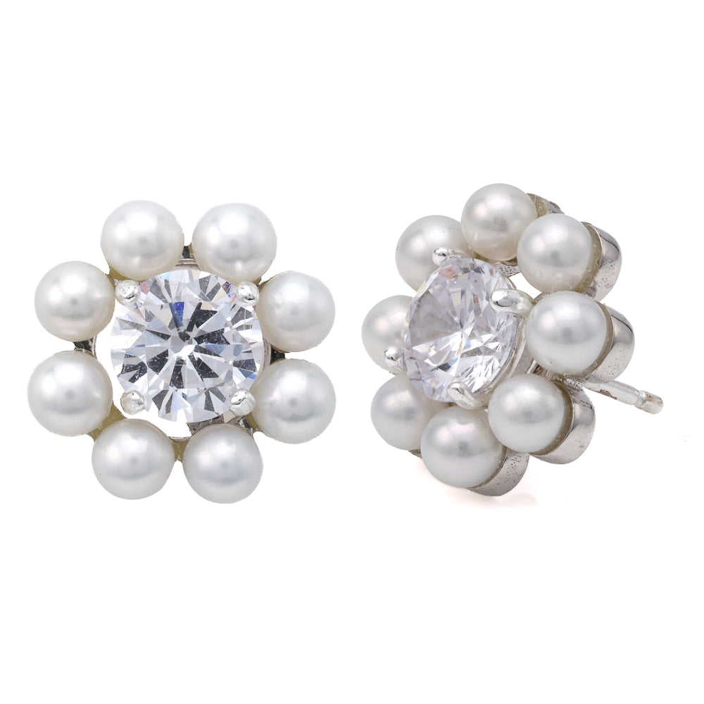 White gold earrings with pearls and gemstones.