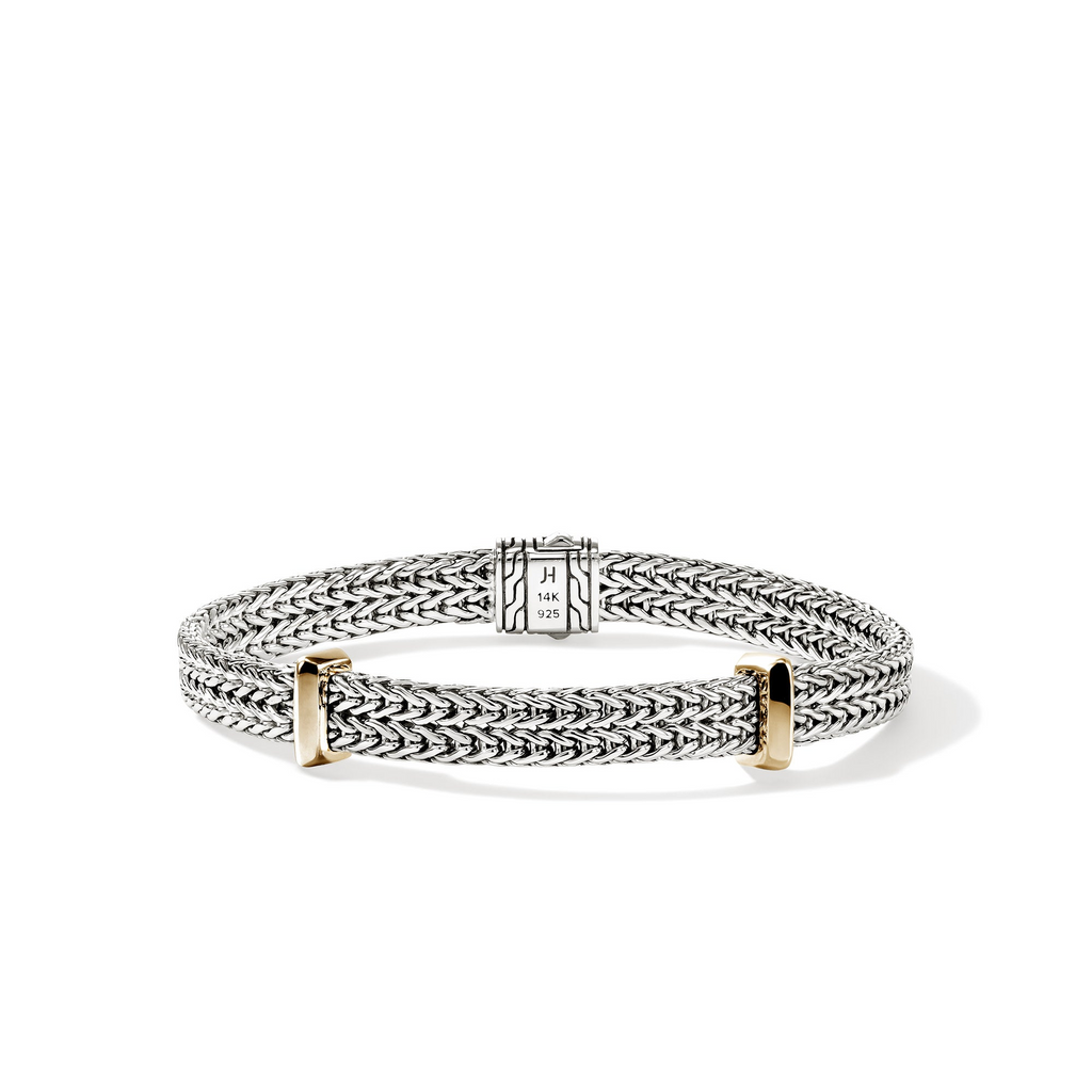 Sterling silver bracelet with gold accents.