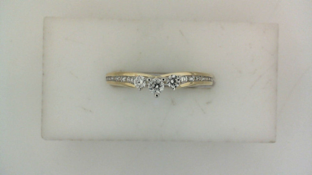 Yellow gold band with round diamonds.