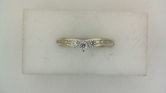 Yellow gold band with round diamonds.