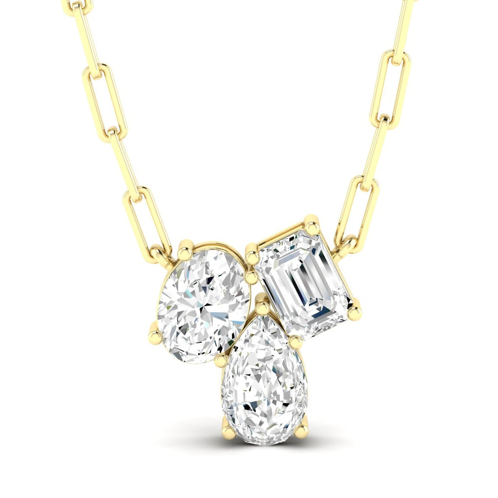 Three-shape diamond pendant on gold chain.