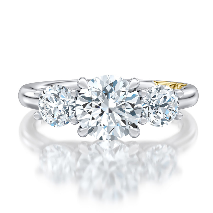 Three-stone diamond ring in white gold.
