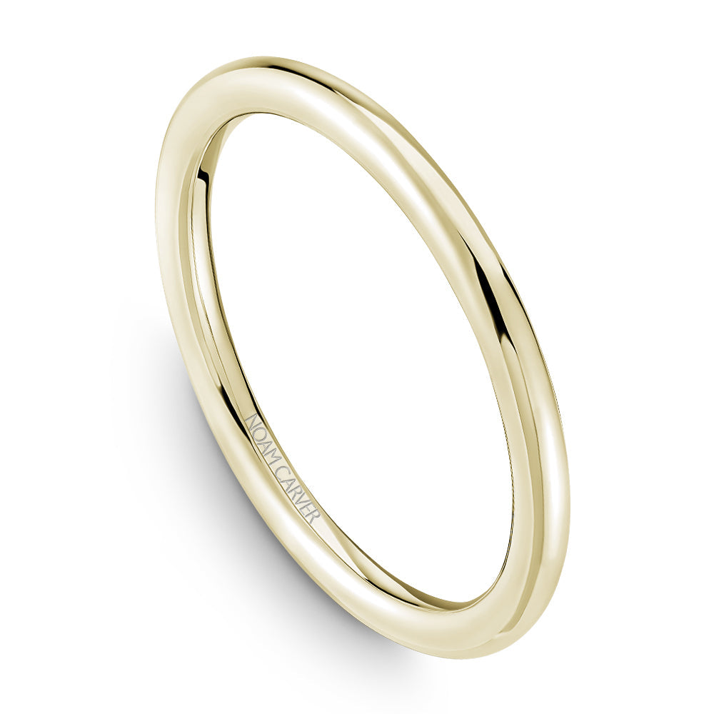 Smooth 14K yellow gold carved band.