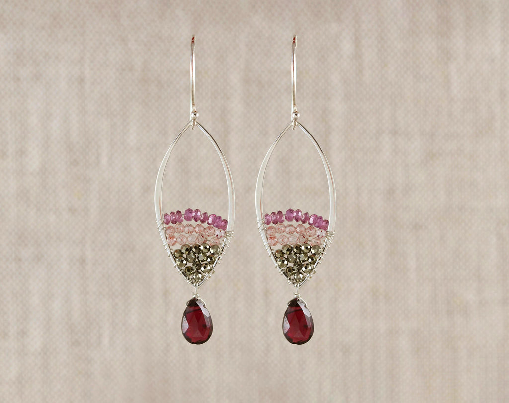 Sterling silver earrings with Rhodolite Garnet.