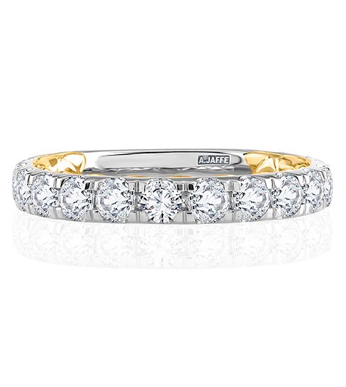 14K white gold band with round diamonds.