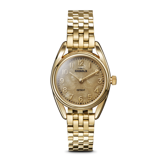 Gold-tone watch with tan dial, stainless steel.