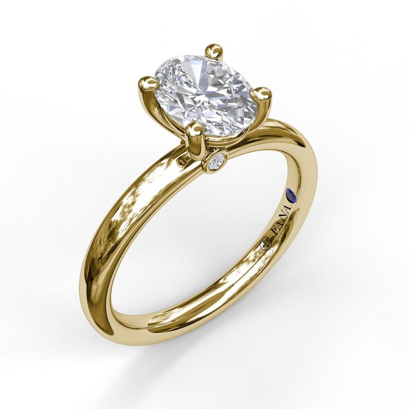14K yellow gold ring with round diamonds.