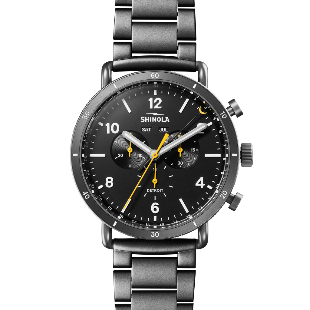 Black dial chronograph watch with stainless steel bracelet.