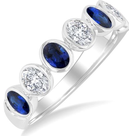 Oval sapphire and diamond band in yellow gold.