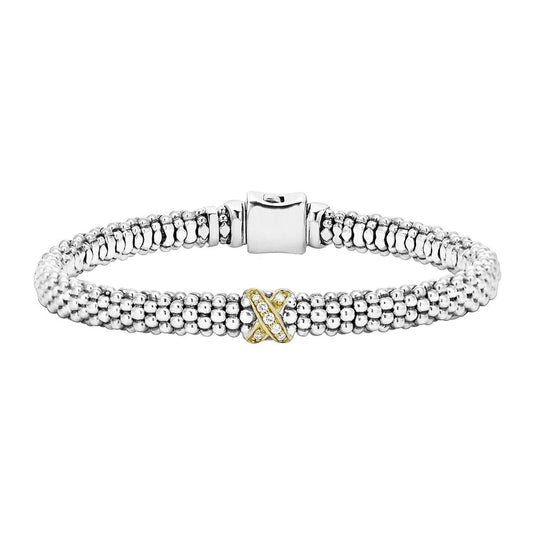 Sterling silver bracelet with diamonds, 18K gold accents.