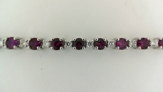 Ruby and diamond bracelet in white gold.