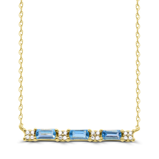 Baguette blue topazes, yellow gold bar necklace.