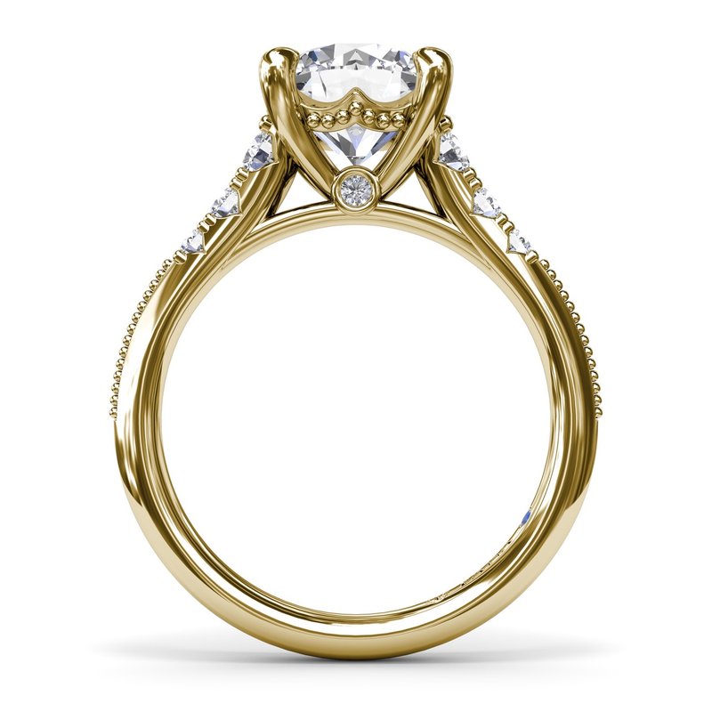 Yellow gold ring with round diamond accents.