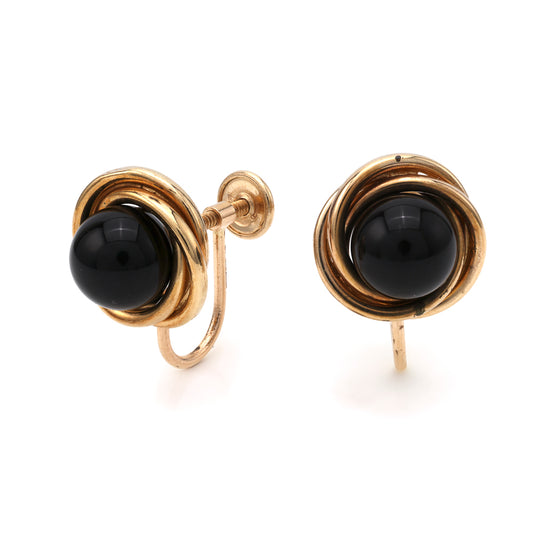 Cabochon onyx earrings in yellow gold setting.