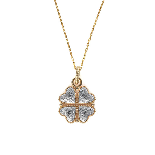 Clover necklace in white and yellow gold.
