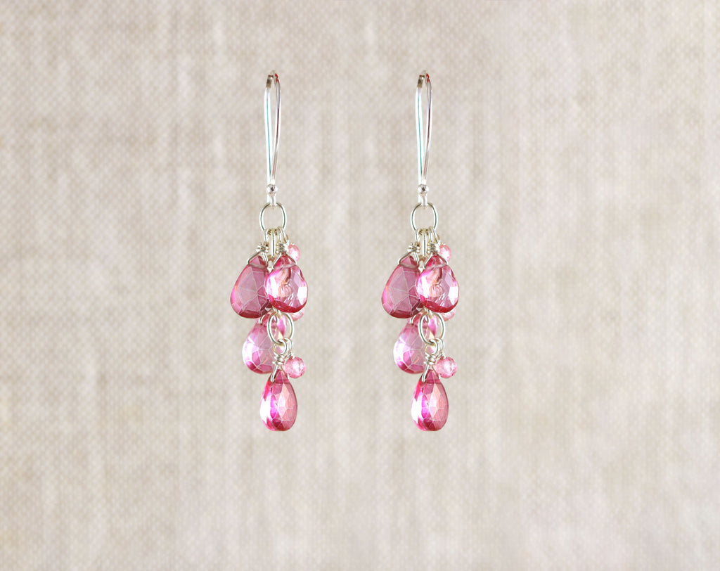 Sterling silver earrings with pink topaz drops.