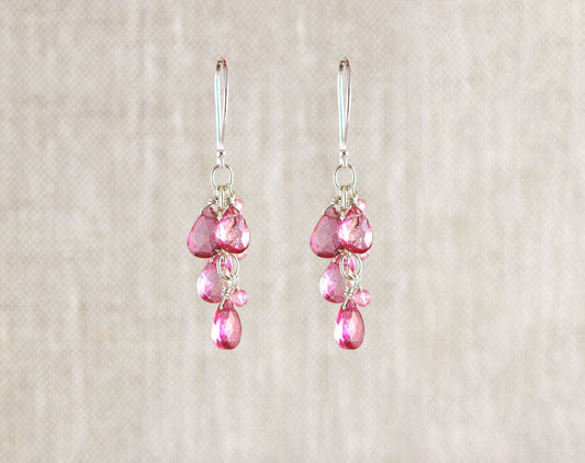 Sterling silver earrings with pink topaz drops.