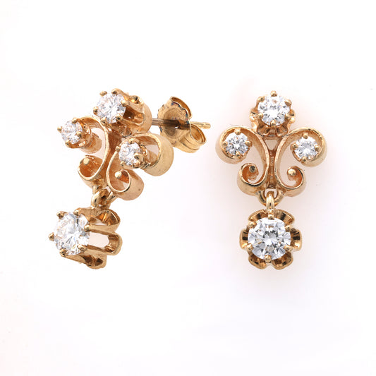 14K gold dangle earrings with round diamonds.