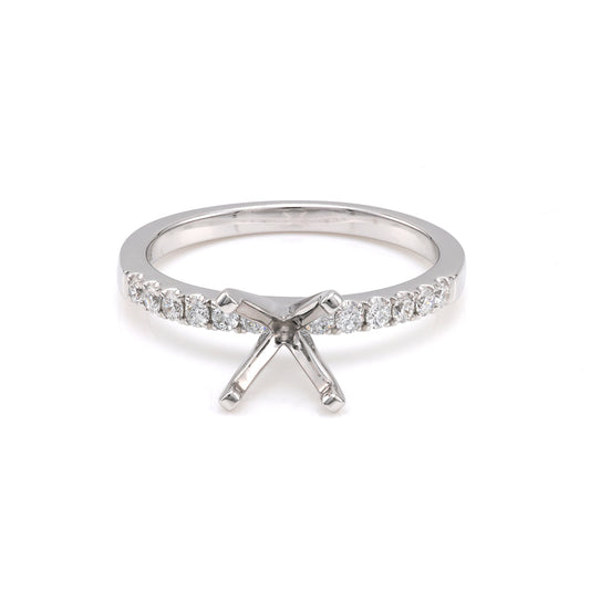 ReMARKable Designs Side Stone Natural Diamond Semi-Mount Engagement Ring in 14 Karat White Gold with 12 Round Diamonds, Clarity: SI2, Color: G/H, totaling 0.21ctw