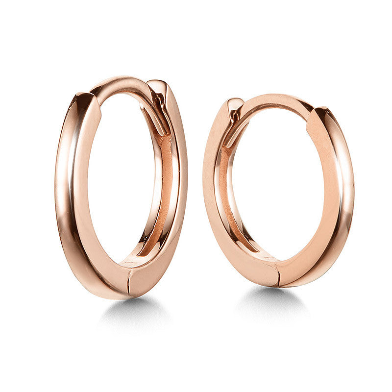 14K rose gold huggie earrings, polished finish.