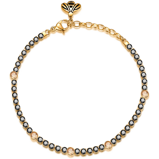 Yellow stainless steel bracelet with colorful gemstones.