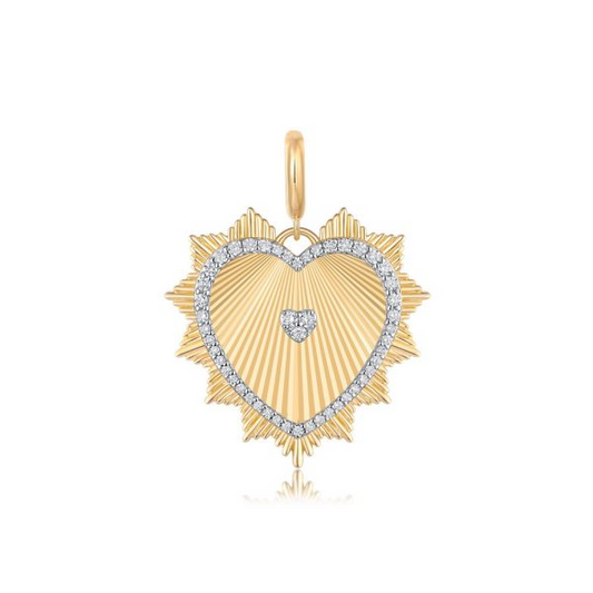 Heart-shaped gold necklace with diamond accents.