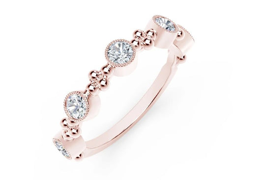 Rose gold ring with round diamonds.