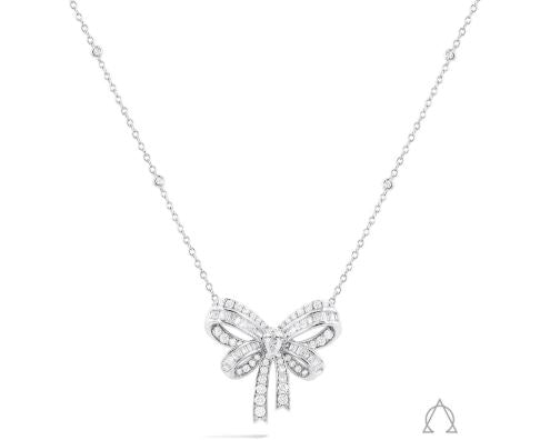 Diamond bow necklace with pear-shaped centerpiece.
