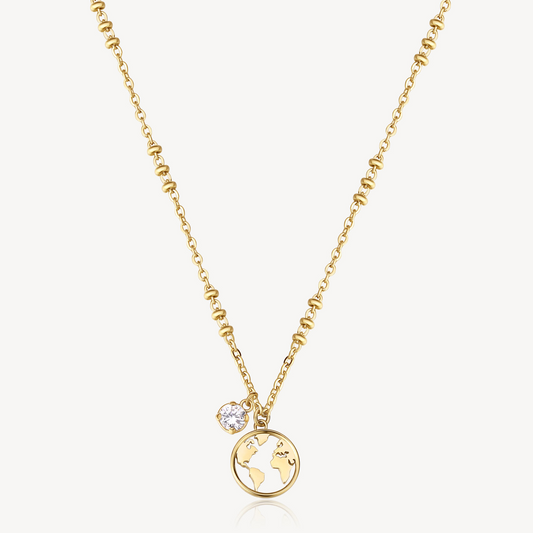 Yellow globe pendant necklace with crystal accent.