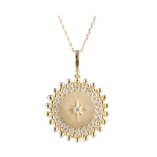 Gold necklace with round diamond pendant.