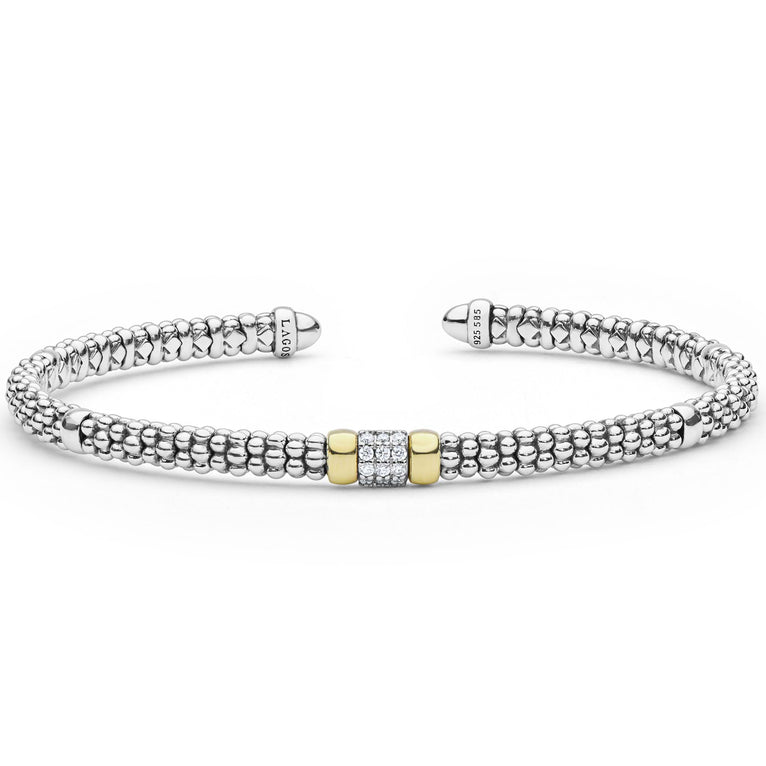 Sterling silver cuff bracelet with diamond accents.