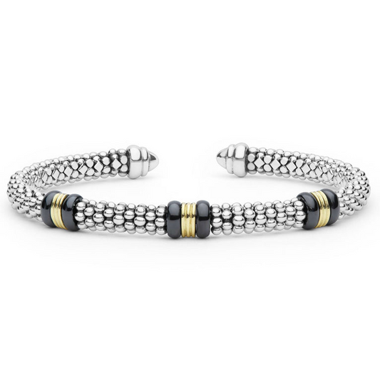 Sterling silver cuff with ceramic accents.