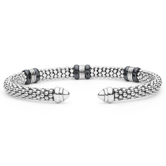 Sterling silver cuff bracelet with ceramic accents.